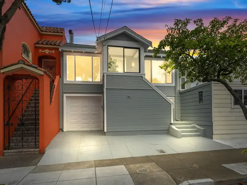 Twilight exterior of 1163 Brunswick Street, a Daly City Peninsula home