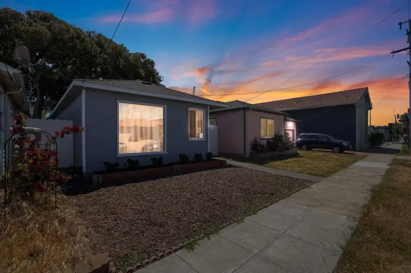 Twilight exterior of 824 3rd Avenue, a San Bruno home